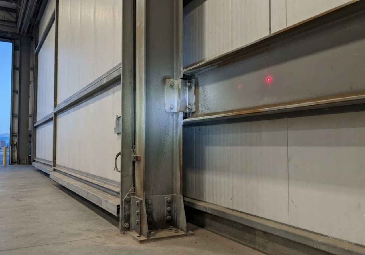 Thermal bridging at a Denver aircraft hangar door track and header