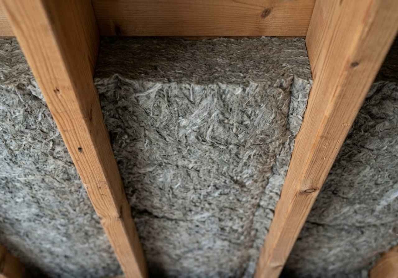 Mineral wool batts in a Denver ceiling for sound control