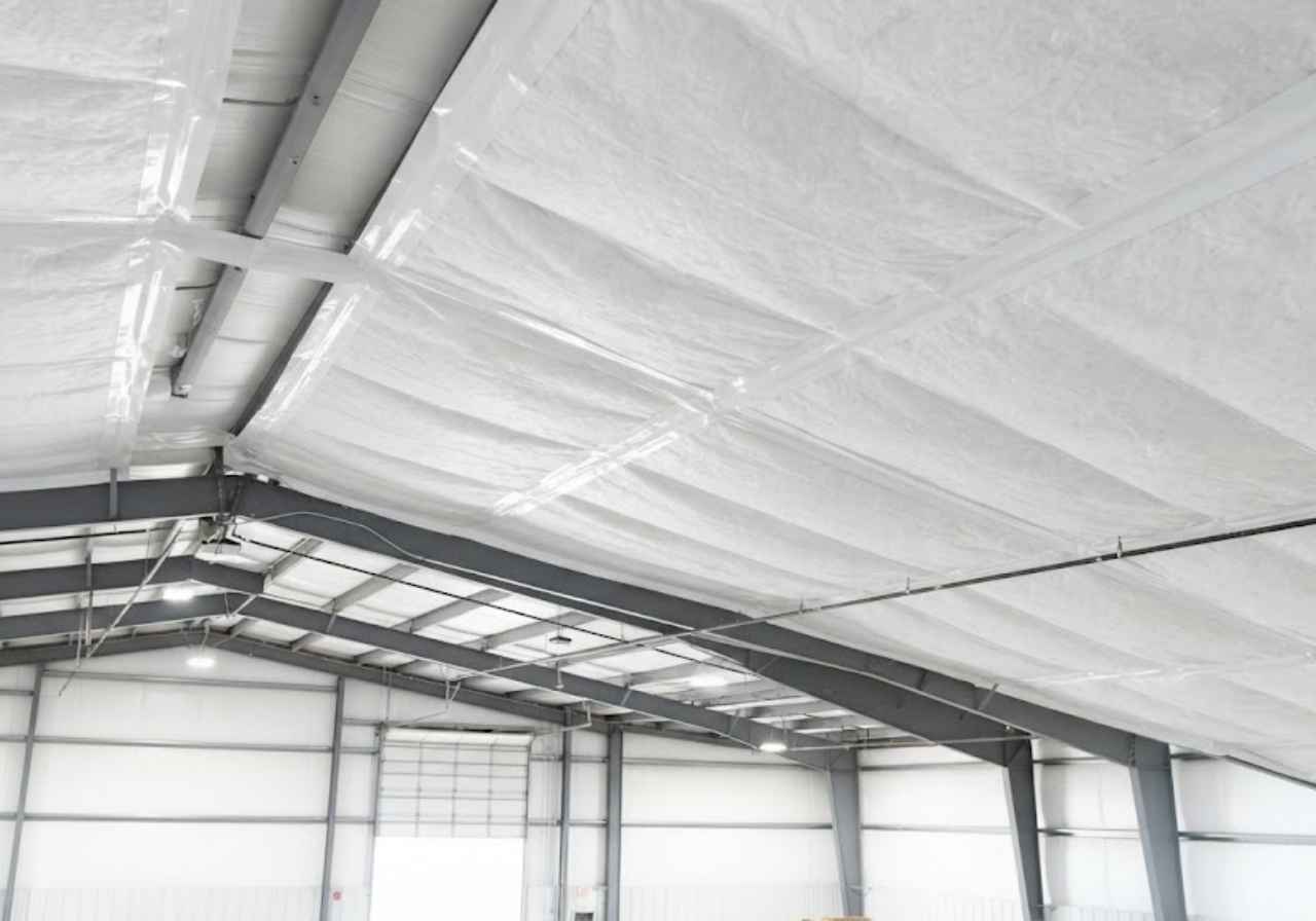 Taped vinyl-faced fiberglass in a Denver steel building roof